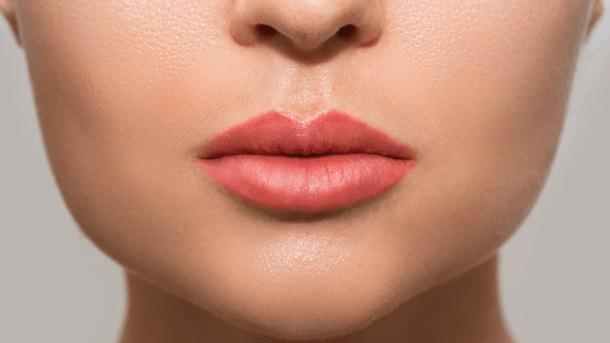 Close-up of soft, naturally tinted lips
